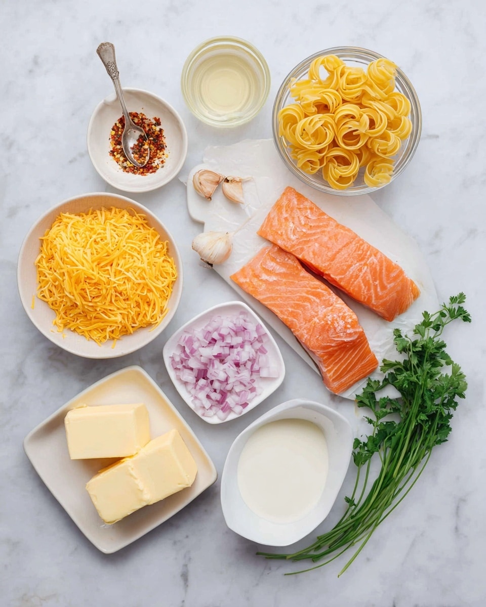 The image shows several small white bowls and dishes arranged on a white marbled surface. At the top right, there are two thick pieces of fresh orange salmon in a white bowl. Next to it on the right is a small glass bowl holding yellow nest-shaped nests of uncooked pasta. Below the pasta, a white bowl is filled with shredded yellow cheese. To the left of the cheese, closer to the center, another white bowl contains chopped red onions. Near the center, there is a small white dish with some liquid, and above it to the left is a square white dish with melted butter. Under the small liquid dish, a ceramic square plate holds two pieces of solid yellow butter. To the left of this plate, a metal teaspoon with chopped garlic sits beside a white oval dish with reddish chili flakes. On the far left, fresh green herbs including parsley and chives lay flat. At the bottom right, a white bowl is filled with smooth, creamy white sauce. The setup is clean, simple, and bright with a natural light look. photo taken with an iphone --ar 4:5 --v 7