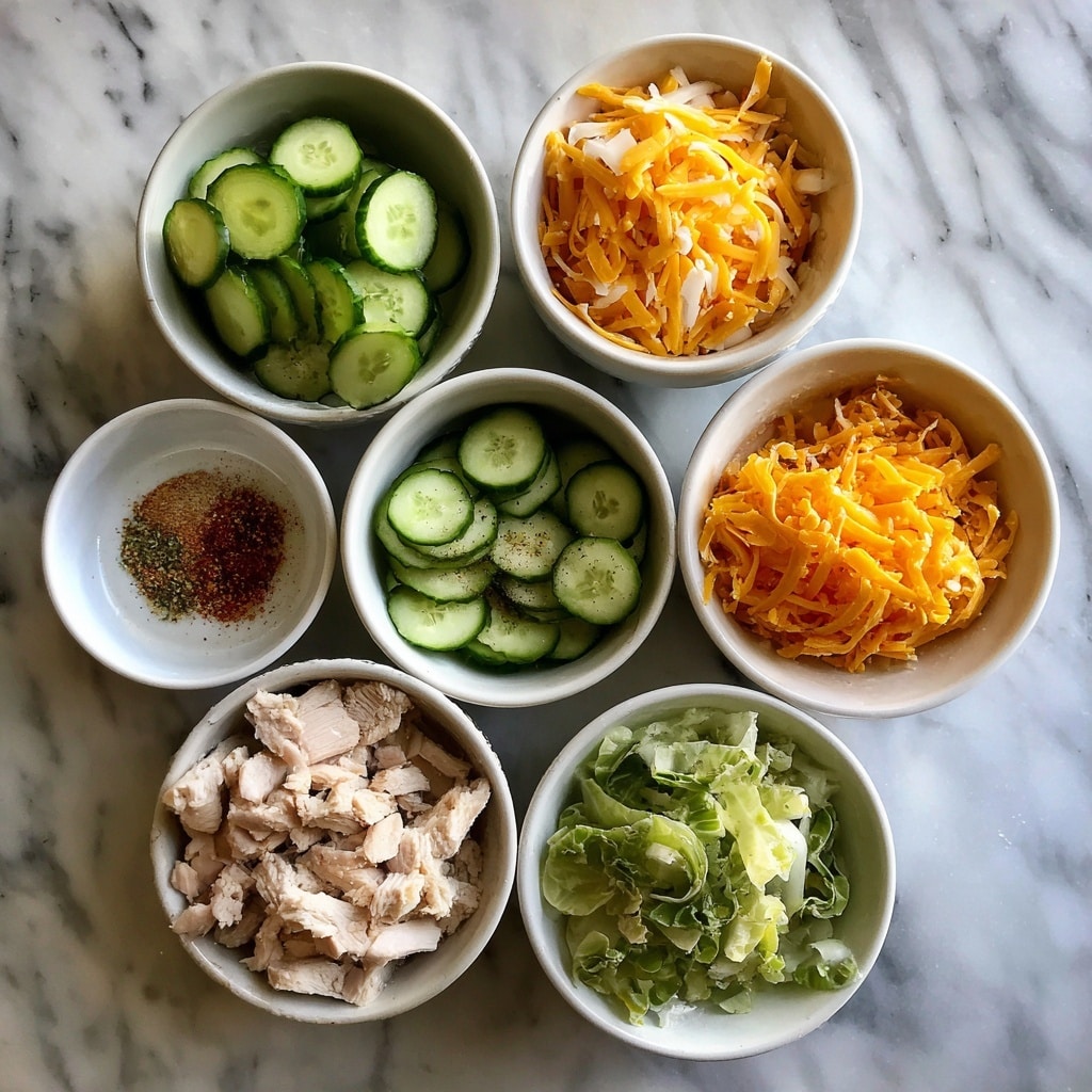 Cucumber Snack Bowl with Cheddar, Chicken, and Avocado Lime Ranch Dressing Recipe - Recipe Image