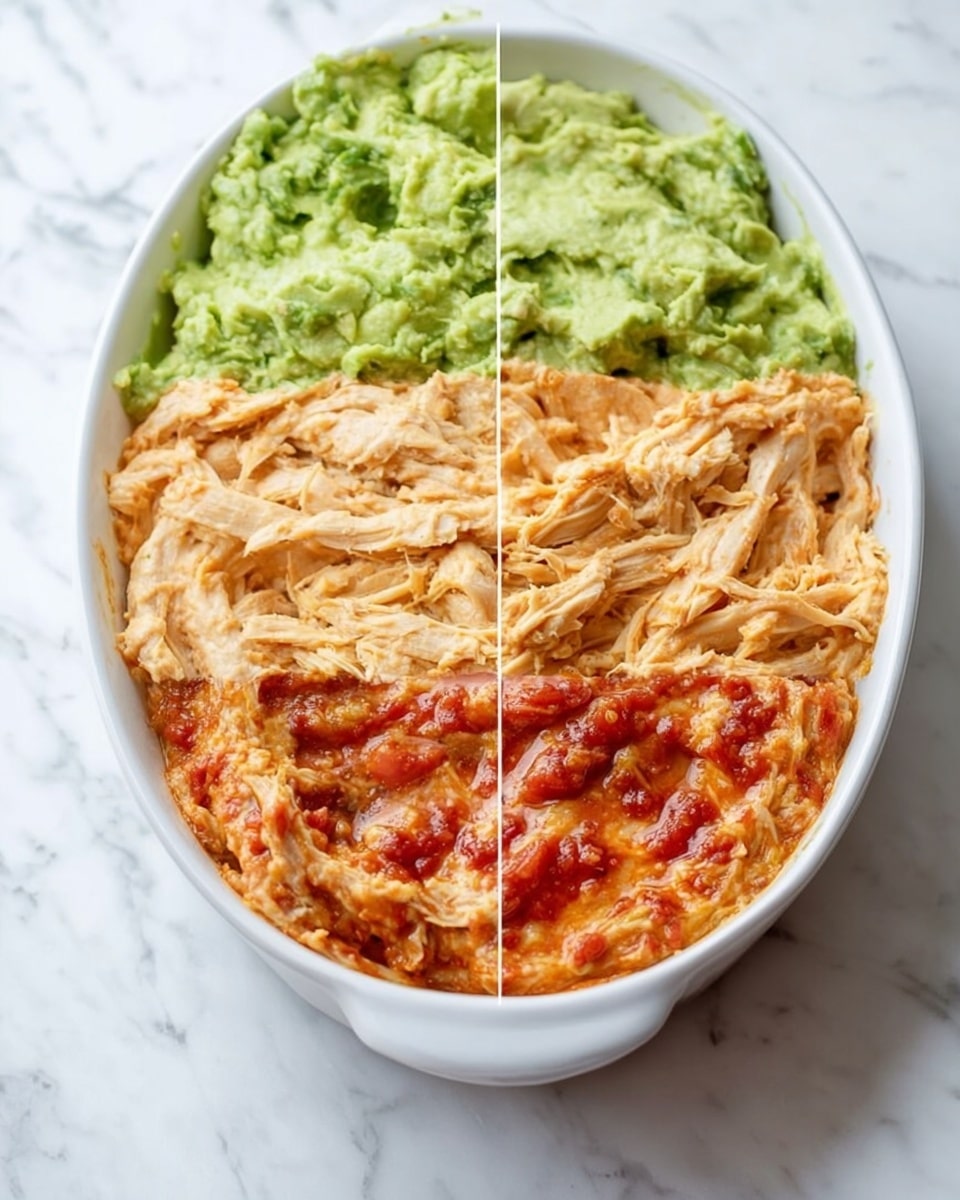 The image shows a white oval dish on a white marbled surface with four stages of a layered dip. The first layer in the top-left corner is bright green mashed avocado with a chunky, creamy texture. The top-right corner displays the second layer of shredded cooked chicken that has a light orange color with a fibrous texture, spread evenly across the dish. The bottom-left corner presents the third layer, which is a smooth, light orange cream spread thickly and evenly over the chicken. The bottom-right corner reveals the final layer, a chunky tomato salsa with red and orange tones covering the creamy layer, offering a wet and slightly shiny finish. photo taken with an iphone --ar 4:5 --v 7