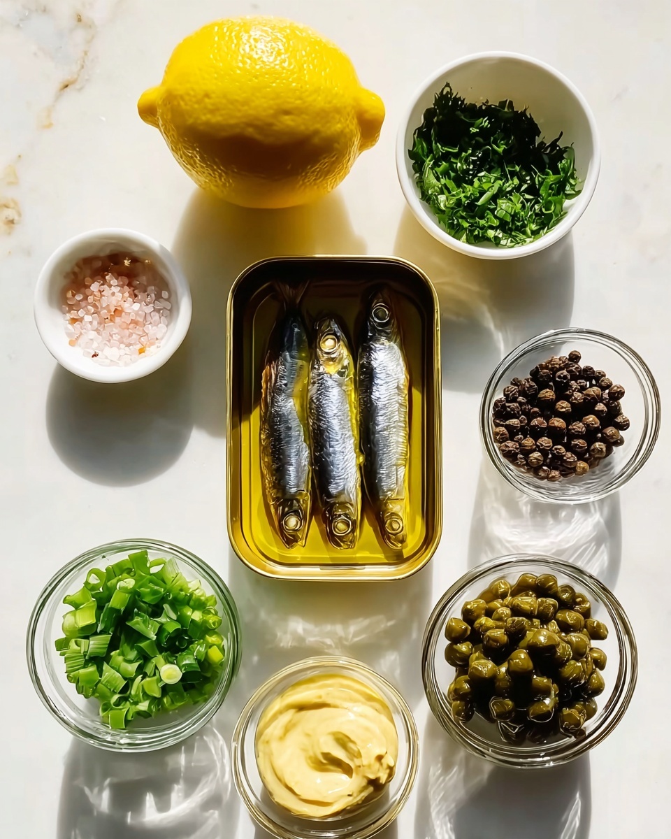The image shows a white marbled surface with a collection of ingredients neatly arranged in small white and clear bowls around a bright yellow lemon on the left. At the center is an open tin of three shiny oily sardines, dark silver and brown in color, laying side by side in golden olive oil. Surrounding this, on the top right is a white bowl with finely chopped green herbs, and next to it is a clear bowl filled with small round black peppercorns. Below that, another clear bowl contains smooth pale yellow mustard or sauce. Directly below the sardines is a clear bowl with small, dark green capers, and to the left is a clear bowl filled with chopped bright green scallions. On the top left near the lemon is a small white bowl with coarse pink salt. The light casts soft shadows, and the whole set has a clean and fresh look. photo taken with an iphone --ar 4:5 --v 7