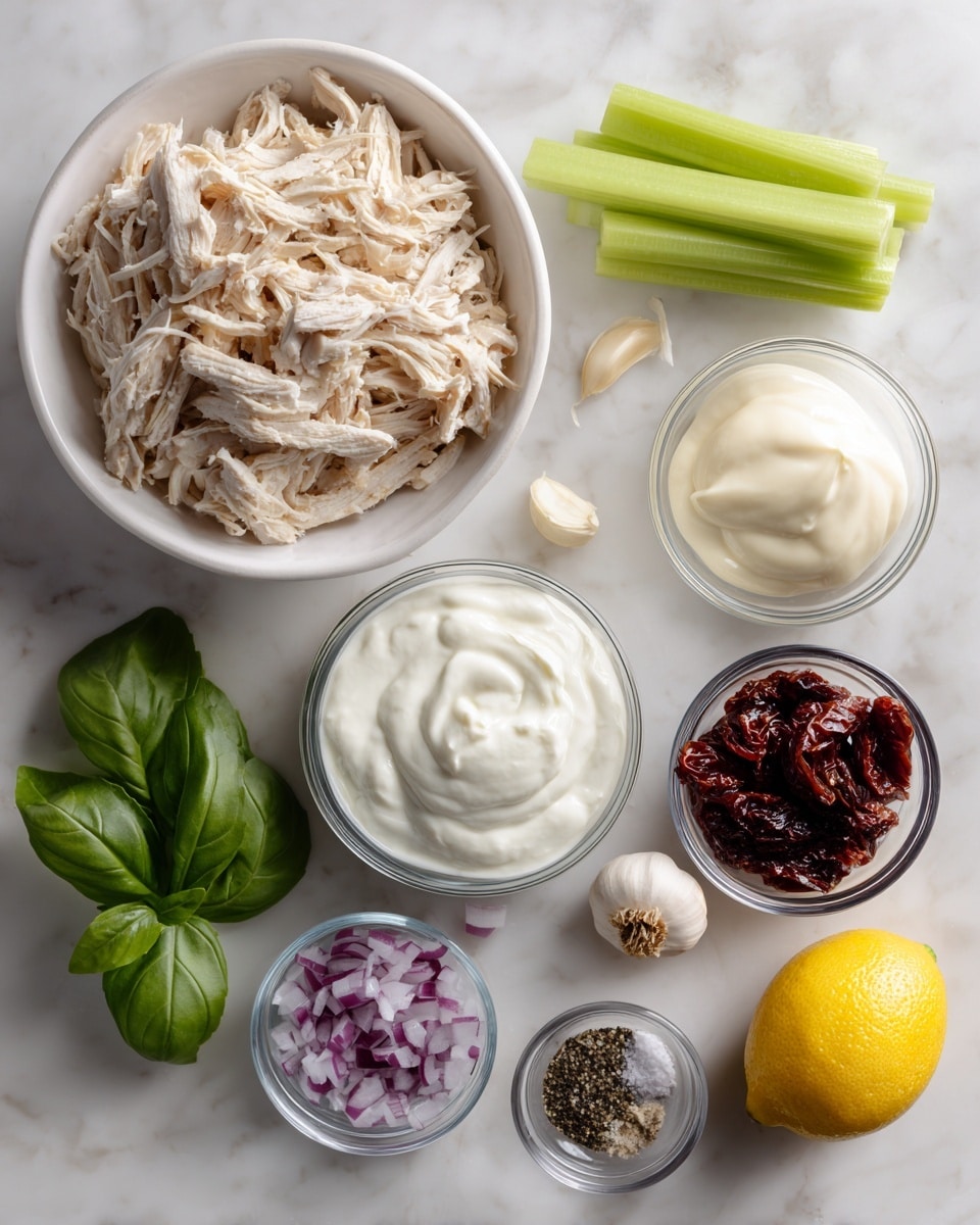 A white bowl filled with light beige shredded chicken takes the top left corner, next to a small clear glass bowl of smooth white mayonnaise on the right. Below these, a small white bowl holds thick, creamy plain Greek yogurt in the center. To the right of the yogurt is a small clear glass bowl filled with dark red sun-dried tomatoes. Below the yogurt sits a small clear glass bowl containing finely chopped purple red onion. A bright yellow lemon sits at the bottom right, near small piles of white salt and black pepper. On the bottom left, there's a small bunch of fresh deep green basil leaves, above which are three fresh green celery sticks and one peeled garlic clove. All items are arranged on a white marbled surface with soft lighting. photo taken with an iphone --ar 4:5 --v 7