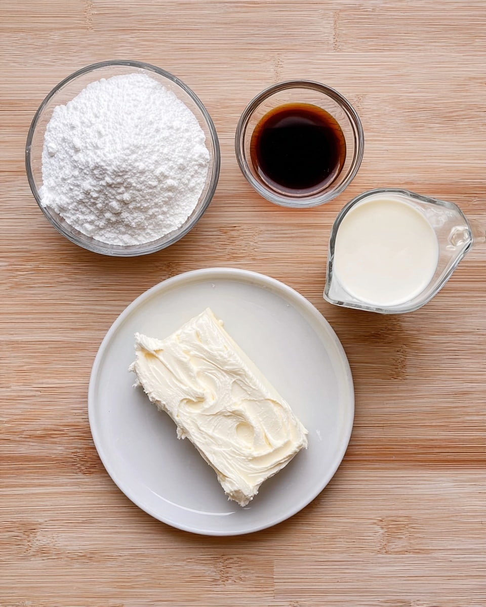The image shows four baking ingredients arranged on a wooden surface. In the bottom right is a white plate holding a block of cream cheese, smooth and slightly soft in texture, with light creases on top. To the left of the plate is a glass bowl filled with fine white powdered sugar, fluffy and heaped slightly above the rim. Above the powdered sugar, there is a small glass bowl containing a dark brown liquid vanilla extract, glossy and smooth. On the top right side, a glass measuring cup holds thick white heavy cream, filled close to the top. The whole setup is neatly placed on a light wooden table with a natural grain pattern. Photo taken with an iphone --ar 4:5 --v 7