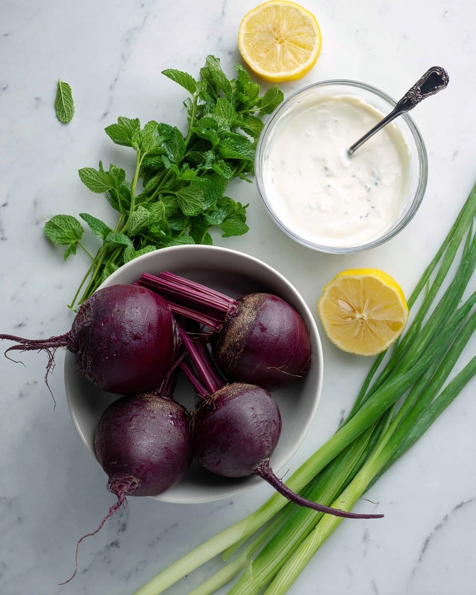The image shows four deep purple beets of different sizes placed together in a white bowl, with loose stems still attached. Above the bowl, a clear glass container holds thick white sauce, with a spoon resting inside. Surrounding these are fresh green herbs, including parsley and mint, and two lemon halves showing their bright yellow inside. Long green onions are arranged on the white marbled surface in the background. photo taken with an iphone --ar 4:5 --v 7