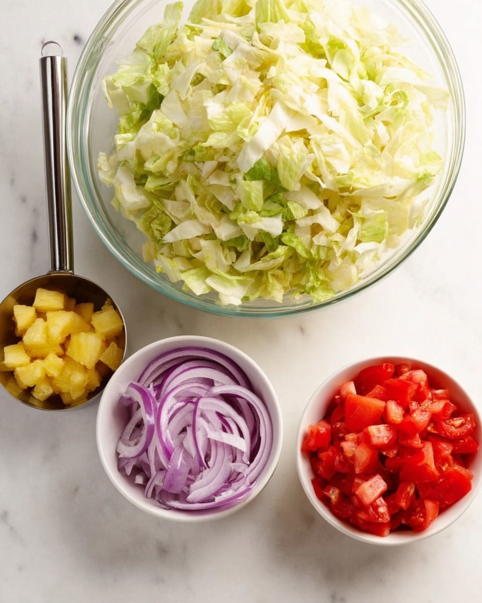 The image shows four containers with different chopped vegetables on a white marbled surface. In the largest clear glass bowl at the top left, there is a large pile of light green and white chopped lettuce with a crisp texture. Below and to the right, there is a small white bowl filled with thin slices of red onion with smooth purple and white layers. Next to it, on the far right, is another small white bowl filled with bright red diced tomatoes that look fresh and juicy. To the left of the onions, there is a metal measuring cup with small yellow chopped pineapple pieces, adding a bright, slightly shiny color contrast. The arrangement is clean and clear, showing separate colors and textures. photo taken with an iphone --ar 4:5 --v 7