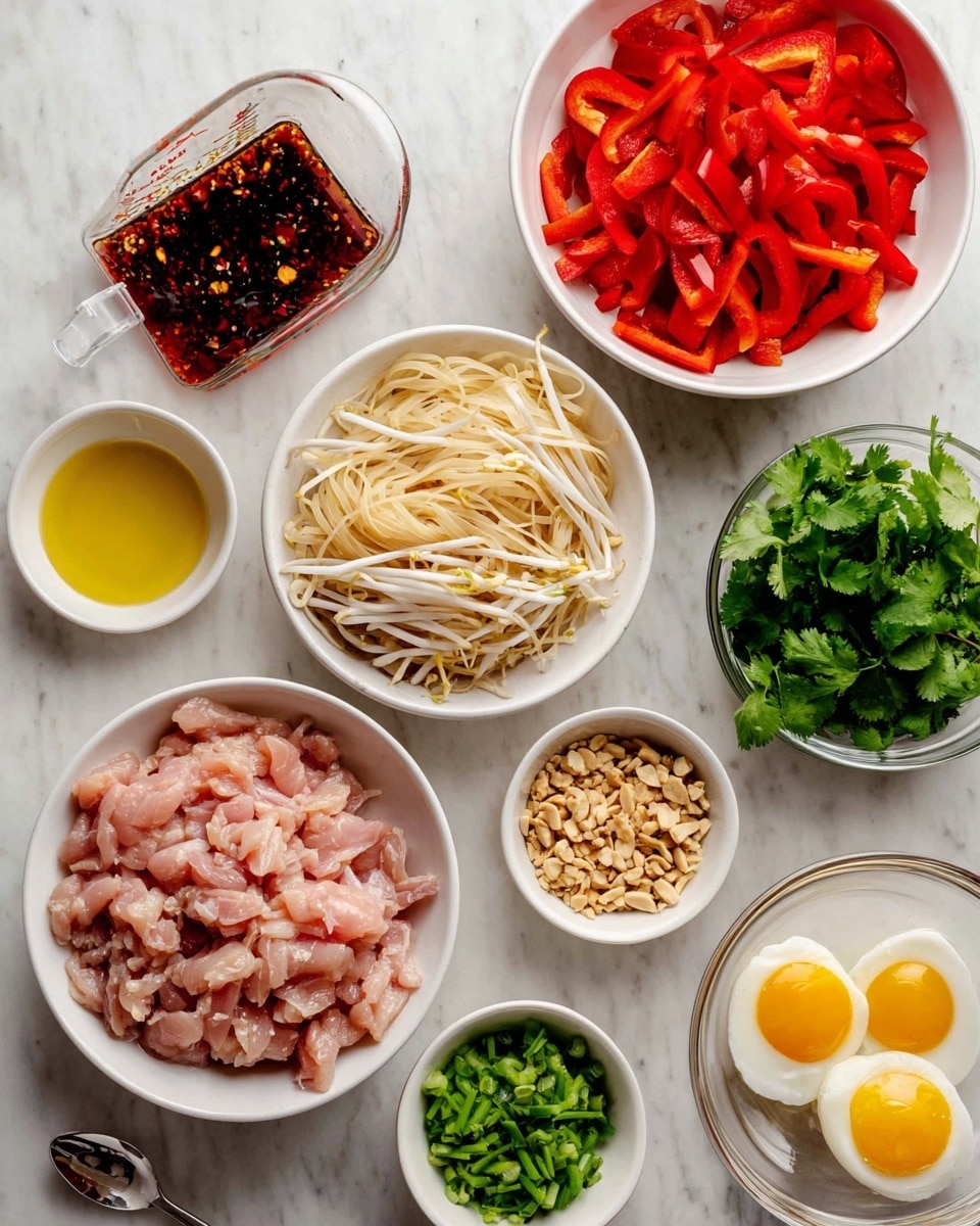 The image shows several white bowls and small glass containers arranged on a white marbled surface. The largest bowl in the bottom left is filled with raw, thinly sliced pink chicken strips. To its right, a white bowl holds thin, spread out, light cream-colored rice noodles. Above the noodles, there's another white bowl filled with bright red sliced bell peppers. Near the top right, a small glass bowl contains fresh green cilantro leaves, while next to it is a bowl with two raw yellow egg yolks and whites, along with a spoon. A smaller white bowl above the chicken holds a light mix of white bean sprouts. Another small glass bowl near the bottom center contains chopped green onions, and a tiny white bowl has crushed light brown peanuts. To the left of the bean sprouts, a small white bowl holds golden olive oil. Finally, a transparent glass measuring cup filled with a dark red sauce featuring tiny bits sits near the top left. photo taken with an iphone --ar 4:5 --v 7