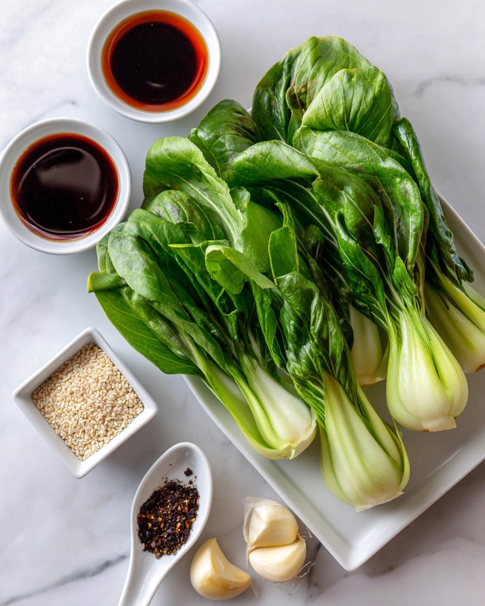 The image shows fresh baby bok choy with bright green leaves and white stalks placed on a white marbled surface. To the left of the bok choy are small white bowls and a white spoon arranged neatly: a bowl of dark brown oil at the top, a bowl of soy sauce below it, and a bowl of Chinese mushroom sauce below the soy sauce. At the bottom left is a square white dish with white sesame seeds. In the center is a white spoon with black pepper inside. Beside the spoon are two peeled garlic cloves. Everything is displayed clearly on the smooth white marbled surface, giving a clean and fresh look. photo taken with an iphone --ar 4:5 --v 7