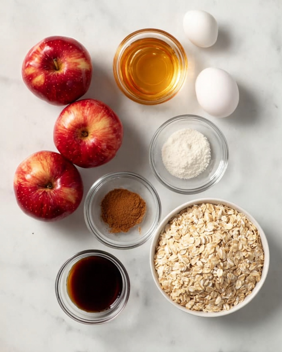 The image shows a white marbled surface with seven items arranged neatly. There are three red apples with a shiny, smooth skin placed close together near the top left. To their right, there is a small glass bowl filled with golden honey. Below the apples, two white eggs rest side by side. Near the eggs and slightly to the right, there is a small glass bowl holding a white powdery substance, and next to it is another small glass bowl with brown cinnamon powder. At the bottom left, there is a small glass bowl filled with dark vanilla liquid. To the right of this is a larger white bowl filled with light beige rolled oats. Everything is spaced with clear gaps, all set on the white marbled surface, photo taken with an iphone --ar 4:5 --v 7