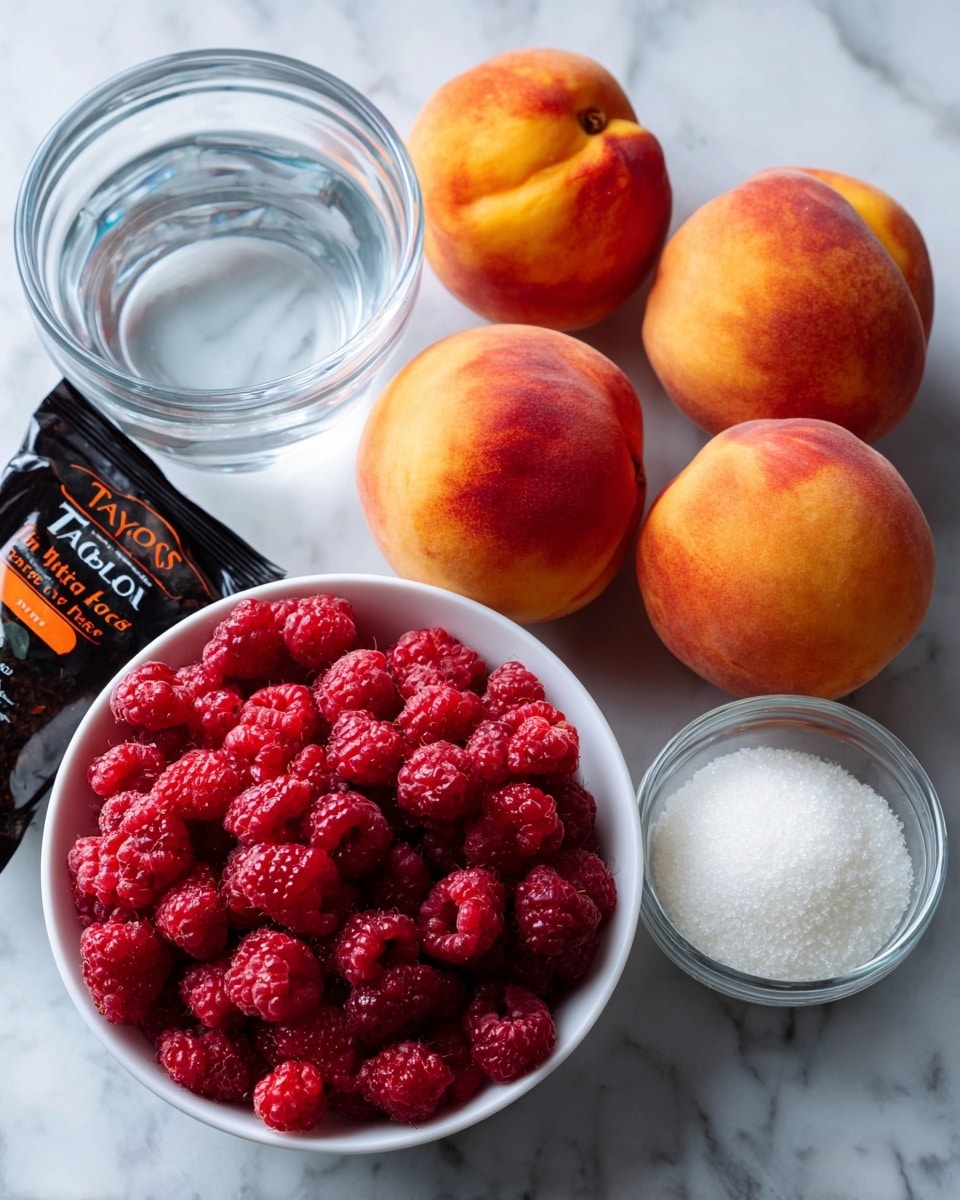The image shows ingredients arranged on a white marbled surface. At the top center, there is a clear glass bowl filled with water. To the right of it, two whole peaches with a fuzzy orange and red skin rest side by side. Below the peaches, a white bowl is filled with frozen raspberries, showing their deep red color and textured surface. To the left of the raspberries, there is an unopened packet of Taylors Assam black tea, black and orange in color. Below the tea packet, another clear glass bowl contains white granulated sugar. All items are spaced evenly with clear labels pointing at each ingredient. Photo taken with an iphone --ar 4:5 --v 7